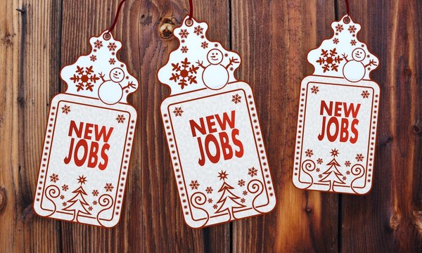 three christmas cards with new jobs sign
