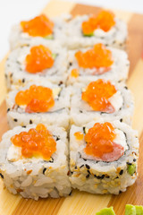 sushi roll with sesame and caviar