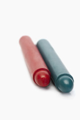 Close-up of red and blue crayons