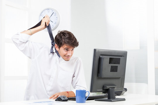Frustrated business man tries to hang himself with his own tie