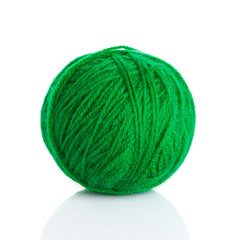 Green wool yarn ball isolated on white