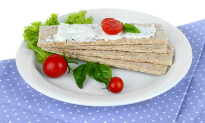 Tasty crispbreads with vegetables, isolated on white