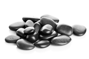 Black massage stones isolated