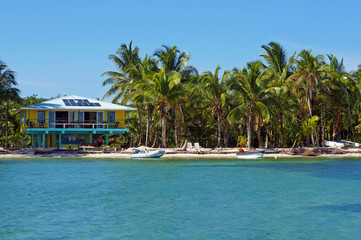 Tropical seashore with beach house