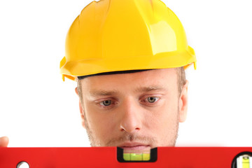 Portrait of young builder isolated on white