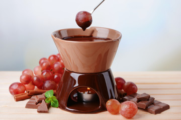 Chocolate fondue with fruits,