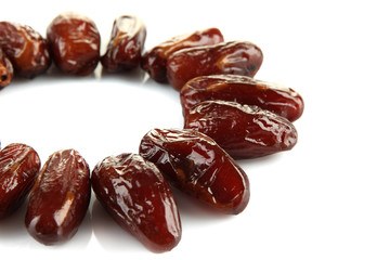 Dried dates isolated on white