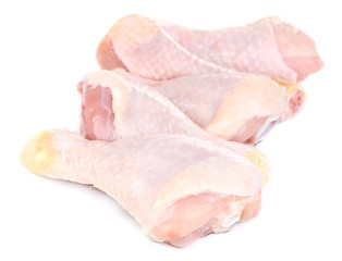 Raw chicken legs isolated on white