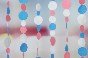 Decorative felt garland on bright background © Africa Studio