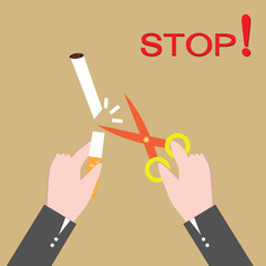 Stop smoking, human hands cutting the cigarette