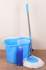 Different tools for cleaning floor in room