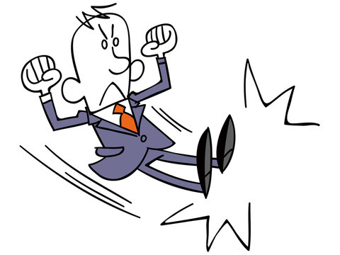 キックするビジネスマン