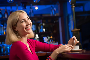 woman with a cup of coffee