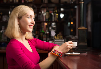 woman with a cup of coffee