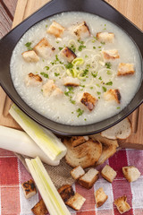 domestic leek soup with parsley and toasted bread