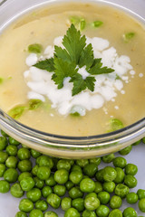 homemade pea soup with cream and parsley