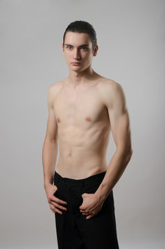Very skinny young man, slim beautiful boy, anorexic body