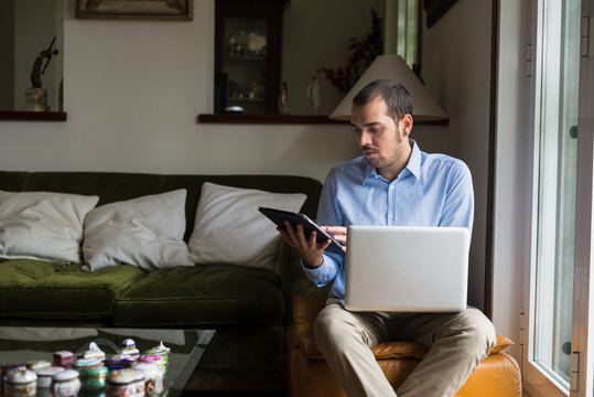 Elegant Business Multitasking Multimedia Man At Home