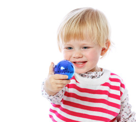 portrait of a little girl holding a Christmas ball, celebration,