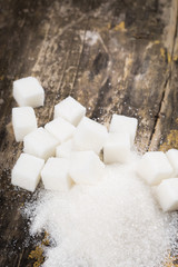 Sugar on wooden background