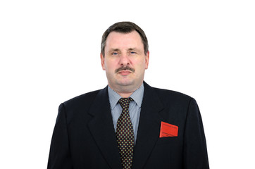 Actor in black suit watches warily