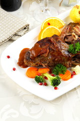 Rabbit pan with vegetables and potato dumplings