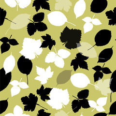 Seamless pattern with garden leaves on light green background