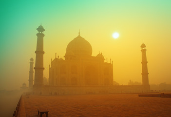 Taj Mahal at sunrise in fog - Powered by Adobe