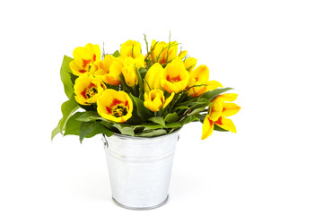yellow tulips in a bucket