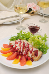 Sliced ​​baked fillet with cranberry sauce