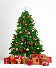 Fototapeta na wymiar Christmas tree and many present boxes
