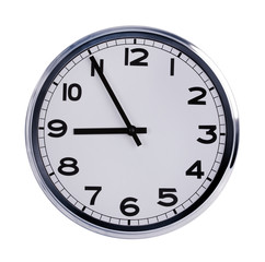 Office clock shows five to nine