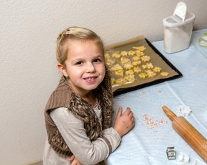 Little girl make cookies