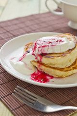 delicious pancakes with sour cream and jam