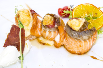 baked salmon rolls on a table in a restaurant