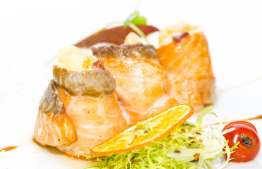baked salmon rolls on a table in a restaurant