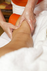 Woman receiving therapeutic massage and lymphatic drainage
