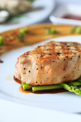 Grilled pork chop with asparagus