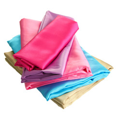 heap of cloth fabrics isolated on white