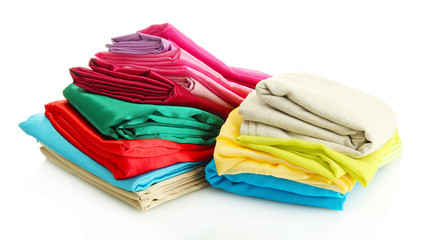 heap of cloth fabrics isolated on white