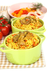 Delicious pilaf with vegetables close up