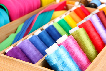 Sewing accessories in wooden box close up