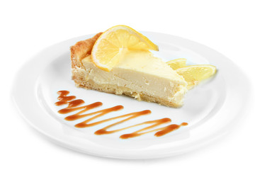 Slice of  lemon cheesecake  and sauce