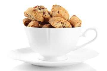 Tasty cookies in cup isolated on white