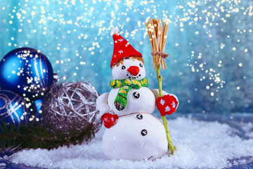 Beautiful snowman and Christmas decor, on bright background