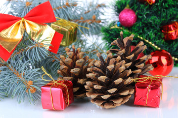 Fototapeta na wymiar Christmas decoration with pine cones close-up