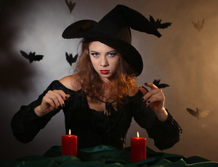 Halloween witch on dark background