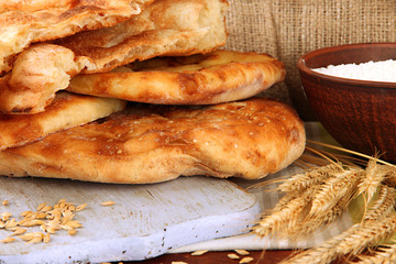 Pita breads with spikes and flour