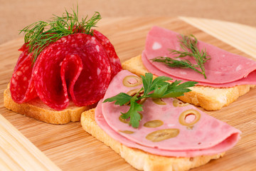 Sandwiches with salami and mortadella