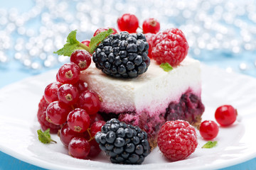 dessert - a piece of cake with fresh berries, close-up